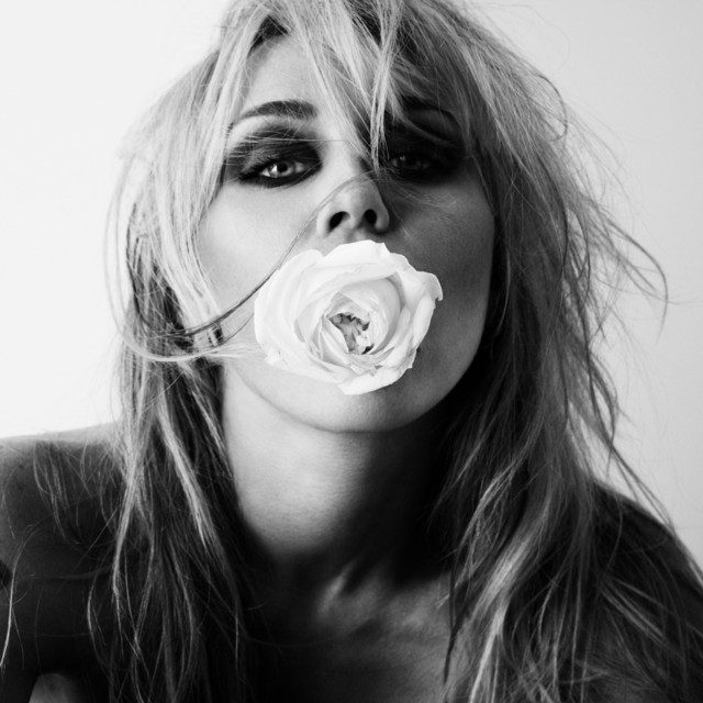 Artwork for Miley's single Bass Persuades